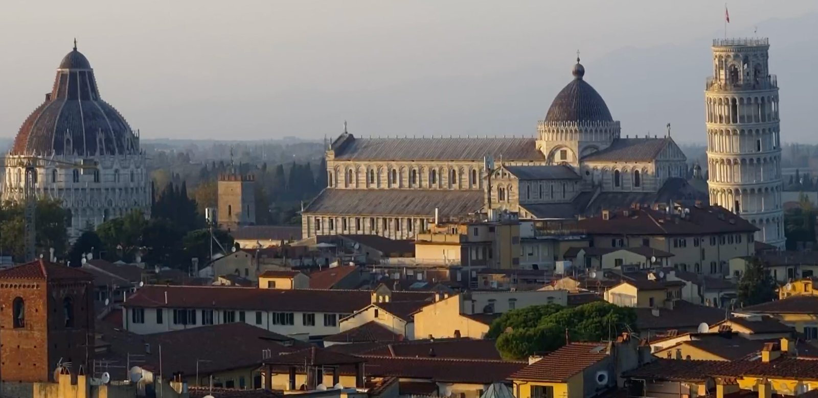 Overview of the Tower of Pisa, the Baptistery and the Duomo in Piazza dei Miracoli and Lungarno